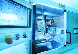 FIGURE 2. A processing chamber for ITO activation using a 300 μm laser line with a three-axis positioning and scanning system is shown. FIGURE 2. A processing chamber for ITO activation using a 300 μm laser line with a three-axis positioning and scanning system is shown.