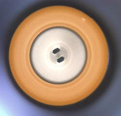 FIGURE 4. The completed splice interface is shown between an end cap and a photonic crystal fiber. FIGURE 4. The completed splice interface is shown between an end cap and a photonic crystal fiber.