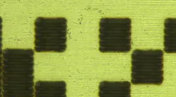 FIGURE 1. This small two-dimensional barcode mark produced on metal is of a type used in the automotive industry.