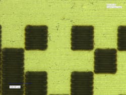 FIGURE 1. This small two-dimensional barcode mark produced on metal is of a type used in the automotive industry. FIGURE 1. This small two-dimensional barcode mark produced on metal is of a type used in the automotive industry.