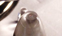 A diamond on a parabolic light collecting lens is the main component of the new angular rate sensor. A diamond on a parabolic light collecting lens is the main component of the new angular rate sensor.