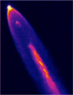 A thermal image shows the Space X Falcon 9 first stage performing propulsive descent on Sept. 21, 2014. Supersonic retropropulsion data obtained from this flight test is being analyzed by NASA to design future Mars landing systems.