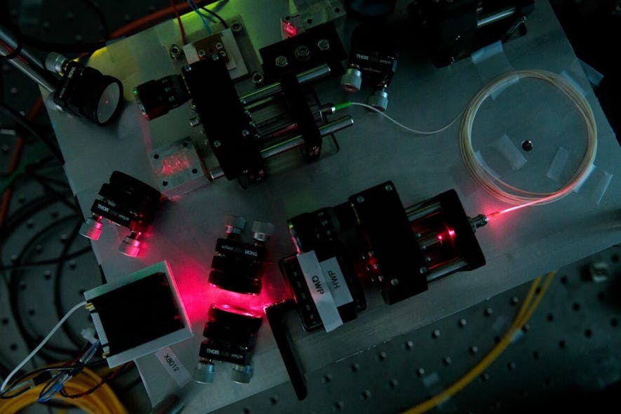 This fiber-optic setup creates entangled photons at telecom wavelengths.