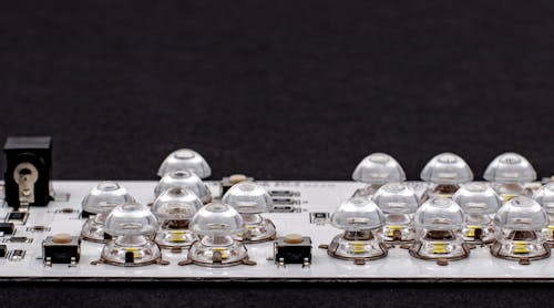 FIGURE 1. Surface-mount optics (SMOs) on an LED circuit board.
