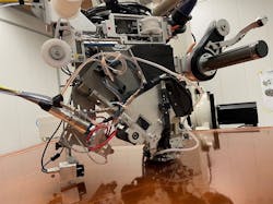 FIGURE 4. The optical module mounted on the arm of the C-solo, ready to lay up. FIGURE 4. The optical module mounted on the arm of the C-solo, ready to lay up.