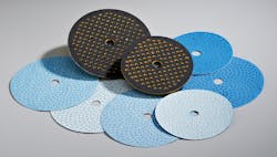 FIGURE 3. The latest-generation, high-density micro-hole abrasive discs with matched backup pad technology. FIGURE 3. The latest-generation, high-density micro-hole abrasive discs with matched backup pad technology.