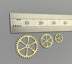 FIGURE 2. Erosion-cut micro gears from 0.35 mm brass.