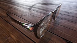 FIGURE 1. Augmented reality glasses with OQmented's LBS-based display solution. FIGURE 1. Augmented reality glasses with OQmented's LBS-based display solution.