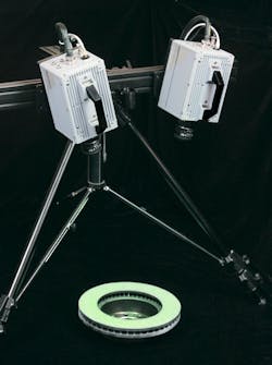 FIGURE 3. Two high-speed imagers are shown mounted above a test brake rotor. FIGURE 3. Two high-speed imagers are shown mounted above a test brake rotor.