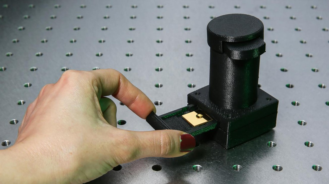 A handheld LED-based device from EPFL and UCLA screens blood for molecules using light intensity changes of biomarkers on a nanoscale chip; no spectrometer needed.