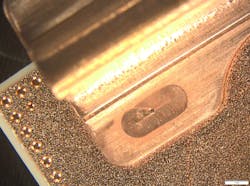 FIGURE 4. An example of a copper contact on DBC plate, welded with the TruDisk 1020 continuous-wave green laser at 0.1 s, is shown. FIGURE 4. An example of a copper contact on DBC plate, welded with the TruDisk 1020 continuous-wave green laser at 0.1 s, is shown.