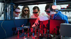 FIGURE 1. In 2019, Ventsislav Valev’s team used a physical effect, the changing color of light scattered from chiral molecules, to measure the chirality present. L-R: David Hooper, Kristina Rusimova, Ventsislav Valev, and Joel Collins.