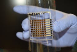 FIGURE 1. This fully 3D-printed flexible OLED display prototype is about 1.5 inches on each side and has 64 pixels, each of which displays light.