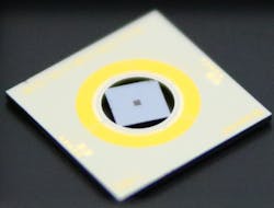 In developing their new tunable lenses, SINTEF researchers suspended a metasurface on a square silicon chip in a thin-film PZT MEMS-actuated ring (yellow).