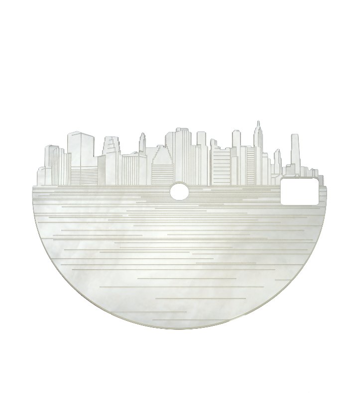 FIGURE 4. This mother of pearl watch face component was cut with a femtosecond laser.