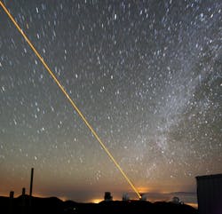 FIGURE 1. At the Keck Observatory in Hawaii, a laser beam is projected into the night sky to create a sodium beacon guide star. FIGURE 1. At the Keck Observatory in Hawaii, a laser beam is projected into the night sky to create a sodium beacon guide star.