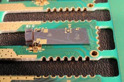FIGURE 1. A hybrid PLC chip for use in short-reach data links includes a DFB laser (top right of chip), two photodetectors to demodulate two external data streams, and a monitor photodetector. FIGURE 1. A hybrid PLC chip for use in short-reach data links includes a DFB laser (top right of chip), two photodetectors to demodulate two external data streams, and a monitor photodetector.