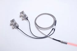 FIGURE 2. The two-line kineFLEX-Hydra fiber delivery system includes the integrated output beam-shaping optics that shape parallel and collinear beams. The system includes two kineMATIX manipulators, one at each input end for aligning and attaching the fibers to the individual lasers. By choosing to decouple the laser from the fiber at the laser side, the fiber can remain in situ and the output end can remain buried within the instrument when the laser is replaced at end of life. This then allows the laser to be located in a more convenient location for servicing and heat dissipation. FIGURE 2. The two-line kineFLEX-Hydra fiber delivery system includes the integrated output beam-shaping optics that shape parallel and collinear beams. The system includes two kineMATIX manipulators, one at each input end for aligning and attaching the fibers to the individual lasers. By choosing to decouple the laser from the fiber at the laser side, the fiber can remain in situ and the output end can remain buried within the instrument when the laser is replaced at end of life. This then allows the laser to be located in a more convenient location for servicing and heat dissipation.