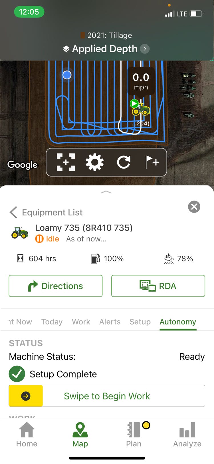FIGURE 2. A new John Deere autonomous tractor can be operated in part with a smartphone app.