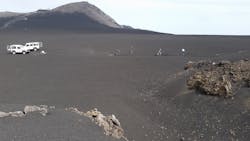 FIGURE 1. Researchers dig the trench for the fiber-optic cable at the site of Mount Etna (2800 m elevation, Piano delle Concazze; the Pizzi Deneri Observatory can be seen in the background. FIGURE 1. Researchers dig the trench for the fiber-optic cable at the site of Mount Etna (2800 m elevation, Piano delle Concazze; the Pizzi Deneri Observatory can be seen in the background.