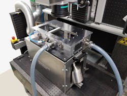 FIGURE 2. Custom-built powder bed integrated into a multi-laser machining station for additive and subtractive laser processing. FIGURE 2. Custom-built powder bed integrated into a multi-laser machining station for additive and subtractive laser processing.