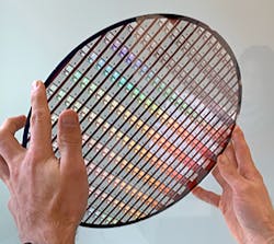 FIGURE 3. A 300 mm wafer; a single wafer can have up to 5000 meta-optics. FIGURE 3. A 300 mm wafer; a single wafer can have up to 5000 meta-optics.
