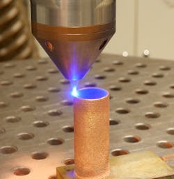 FIGURE 4. Additive manufacturing using copper powder by directed energy deposition and a blue diode laser.
