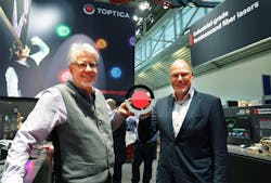 In 2022, Wilhelm Kaenders, Ph.D., and Thomas Renner (right), Ph.D., introduced a new logo for the Toptica Group.