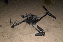 FIGURE 2. A Group 2 rotary-wing drone shot down by HELWS during live-fire demonstrations in 2022 at White Sands Missile Range in New Mexico. FIGURE 2. A Group 2 rotary-wing drone shot down by HELWS during live-fire demonstrations in 2022 at White Sands Missile Range in New Mexico.