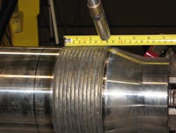FIGURE 1. Typical robotic hybrid laser arc welding (HLAW) process.