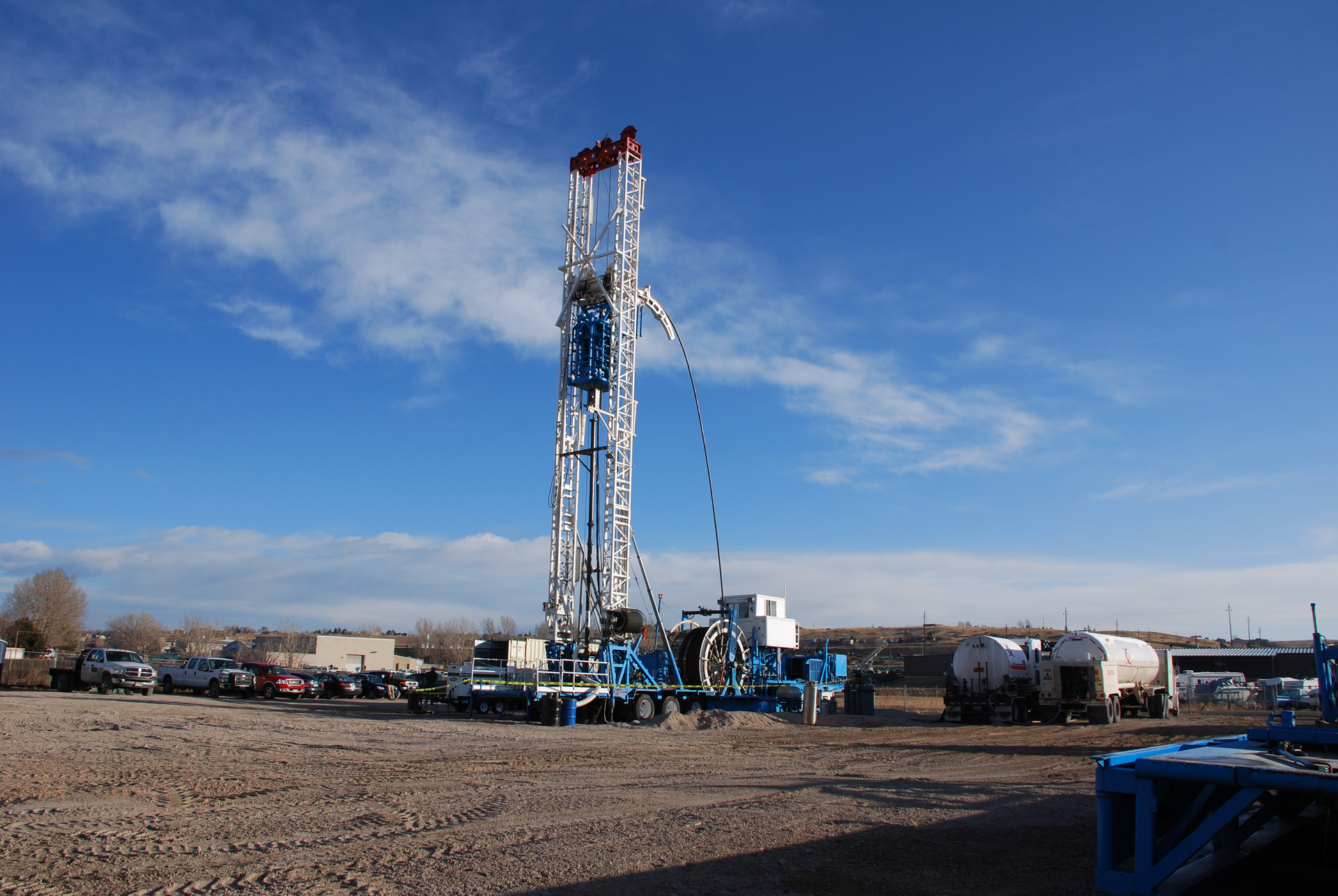 A portable oil-drilling setup includes a 20 kW fiber laser and a low-loss fiber-optic cable. The high-power 1070 nm light is delivered down the well where it fractures rock, allowing a low-power mechanical drill to remove the rock. The process potentially cuts the required power for drilling by nearly 90%.