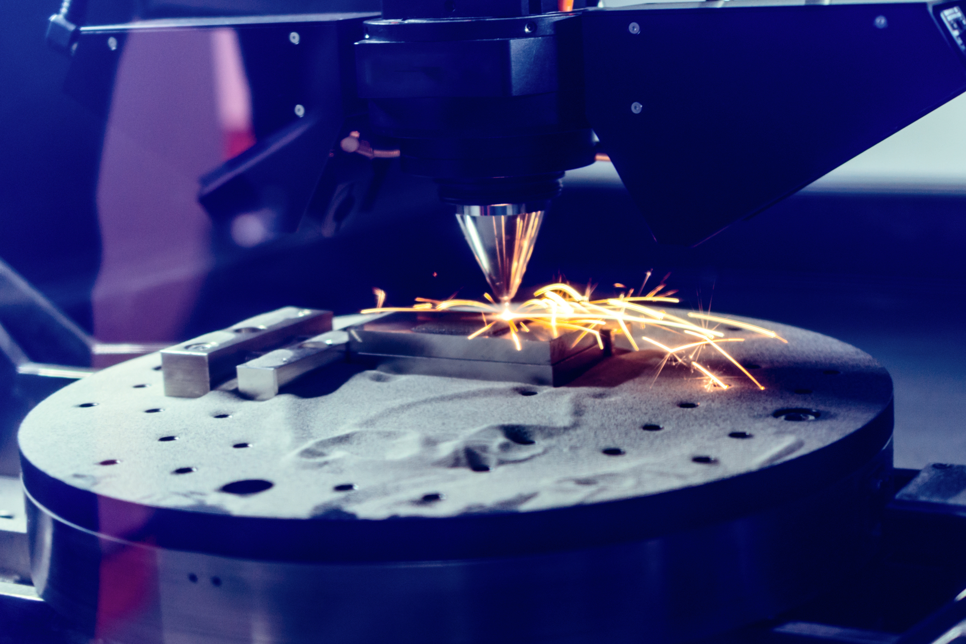 FIGURE 2. Laser-based additive manufacturing systems require precise output powers and focused spot sizes at the process to consistently produce quality parts.