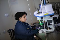 FIGURE 3. The new system works with Raman spectroscopy, including a confocal Raman spectrometer (shown here, operated by researcher Alexis Weber) and laser light to image bodily fluids. FIGURE 3. The new system works with Raman spectroscopy, including a confocal Raman spectrometer (shown here, operated by researcher Alexis Weber) and laser light to image bodily fluids.