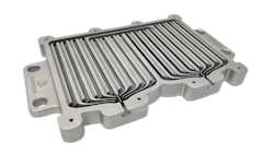 FIGURE 3. Cut section of an optimized liquid-cooled heat exchanger printed without supports on 3D Systems’ DMP Flex 350 Dual using LaserForm AlSi7Mg0.6 (A) material. This saves 83% space and eliminates 97 parts compared to a conventional air-cooled heat sink. FIGURE 3. Cut section of an optimized liquid-cooled heat exchanger printed without supports on 3D Systems’ DMP Flex 350 Dual using LaserForm AlSi7Mg0.6 (A) material. This saves 83% space and eliminates 97 parts compared to a conventional air-cooled heat sink.