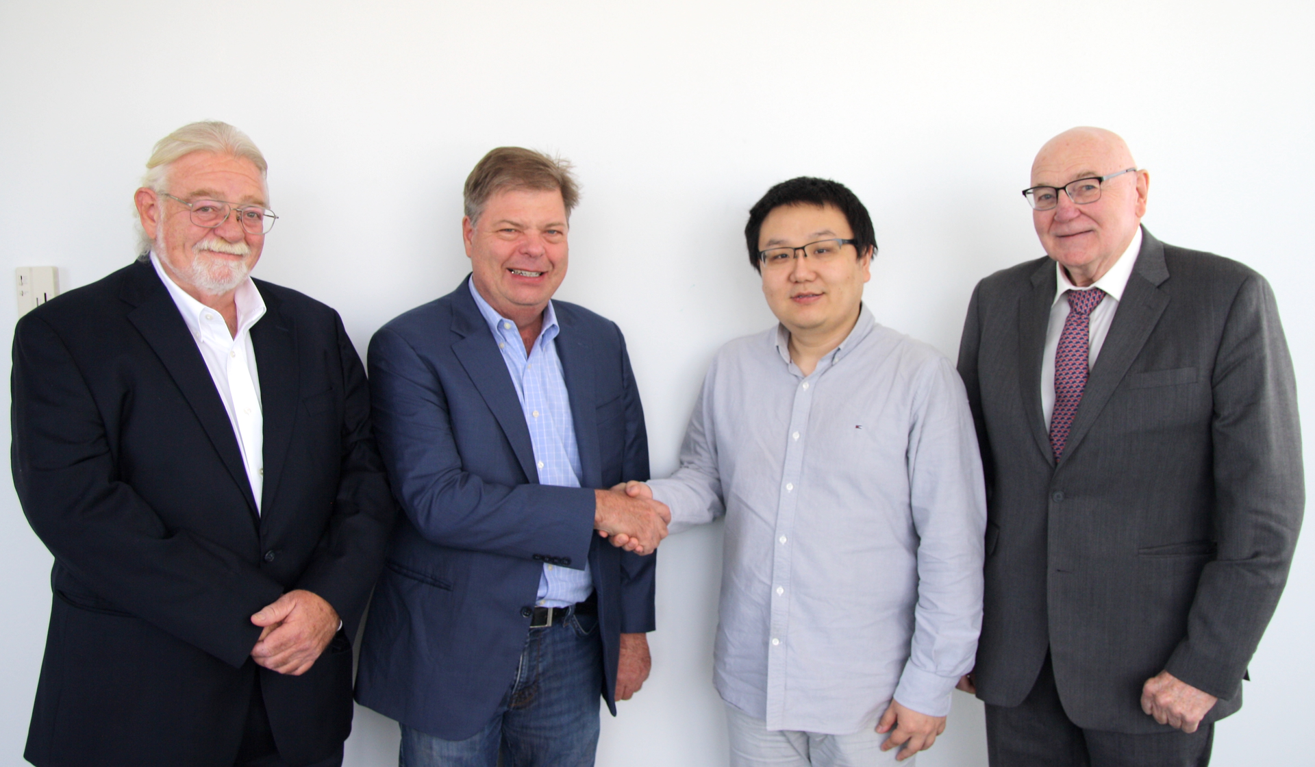 Dr. Preston Young (Photodigm), CEO Bill Stuart (Photodigm), Weida Zhang, Dr. Gary Evans (SMU)