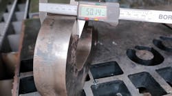 FIGURE 1. An example of laser cutting 50-mm-thick materials. FIGURE 1. An example of laser cutting 50-mm-thick materials.