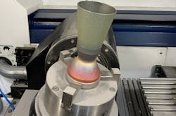 FIGURE 1. LMD processing of the 718 portion of the hybrid component. FIGURE 1. LMD processing of the 718 portion of the hybrid component.