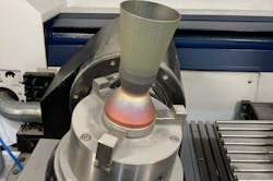 FIGURE 1. LMD processing of the 718 portion of the hybrid component. FIGURE 1. LMD processing of the 718 portion of the hybrid component.
