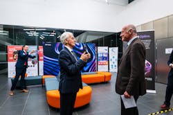 Gérard Mourou presenting the Advocate of Optics award to Alain Rousset. Gérard Mourou presenting the Advocate of Optics award to Alain Rousset.