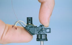 FIGURE 1. A 3-g MINI2P miniaturized head-mounted two-photon microscope. FIGURE 1. A 3-g MINI2P miniaturized head-mounted two-photon microscope.