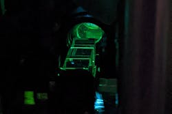 FIGURE 2. Close-up of the cascade of beam-splitting prisms that allow the new microscope to sense more image planes than a conventional microscope. FIGURE 2. Close-up of the cascade of beam-splitting prisms that allow the new microscope to sense more image planes than a conventional microscope.