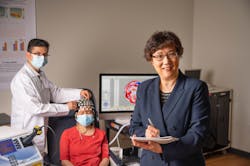 A team led by researcher Dr. Hanli Liu (right) is currently developing a dual-mode brain sensing device that pairs near-IR spectroscopy with EEG for quicker, more accurate detection of Alzheimer’s disease. A team led by researcher Dr. Hanli Liu (right) is currently developing a dual-mode brain sensing device that pairs near-IR spectroscopy with EEG for quicker, more accurate detection of Alzheimer’s disease.