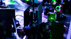 Part of an ultrafast laser system used for high-harmonic generation (HHG).
