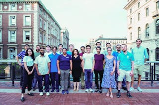 FIGURE 1. Michal Lipson (center) and her Nanophotonics Group, including Mateus Corato-Zanarella (front row, third from left).