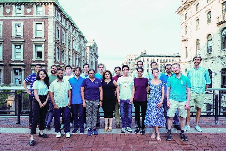 FIGURE 1. Michal Lipson (center) and her Nanophotonics Group, including Mateus Corato-Zanarella (front row, third from left).