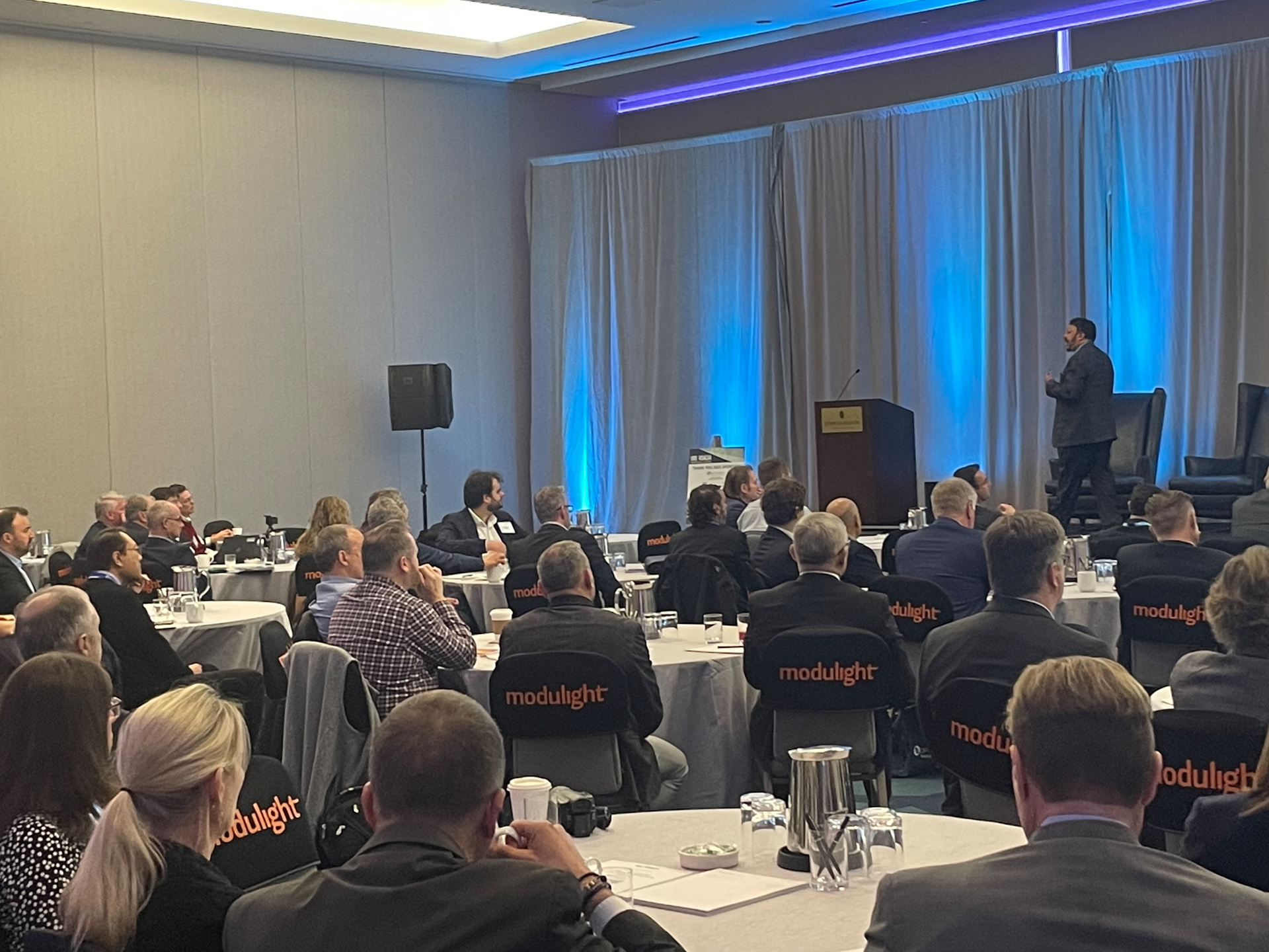 Dr. Anirban Basu, economist and chairman/CEO of Sage Policy Group, giving his lively keynote talk at the Laser Focus World Executive Forum on January 30, 2023.