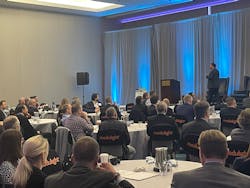 Dr. Anirban Basu, economist and chairman/CEO of Sage Policy Group, giving his lively keynote talk at the Laser Focus World Executive Forum on January 30, 2023.