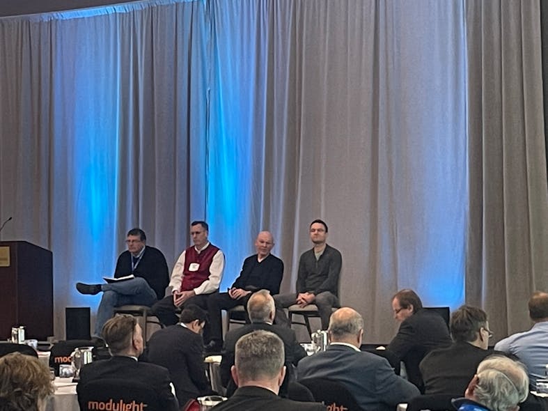 (L-R) David Piehler, Peter Winzer, Michael Lebby, and Robert Blum addressed the manufacturing plans of photonic integrated circuits (PICs) by semiconductor fabs and how the photonics industry can transfer their processes to the semiconductor industry during their panel discussion at the Laser Focus World Executive Forum.