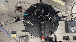 FIGURE 1. The Busani Research Group&rsquo;s AFM probe for semiconductor patterning, equipped with an aluminum nitrate laser nanowire used as a lithographic tip, allows traditional laser scanning to be performed along with spectroscopy to record the fluorescence signal of the material.