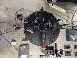 FIGURE 1. The Busani Research Group’s AFM probe for semiconductor patterning, equipped with an aluminum nitrate laser nanowire used as a lithographic tip, allows traditional laser scanning to be performed along with spectroscopy to record the fluorescence signal of the material. FIGURE 1. The Busani Research Group’s AFM probe for semiconductor patterning, equipped with an aluminum nitrate laser nanowire used as a lithographic tip, allows traditional laser scanning to be performed along with spectroscopy to record the fluorescence signal of the material.